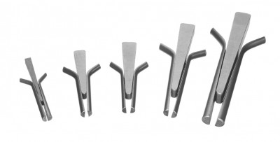 A set of splitting wedges shims and drills used for shaping stone
